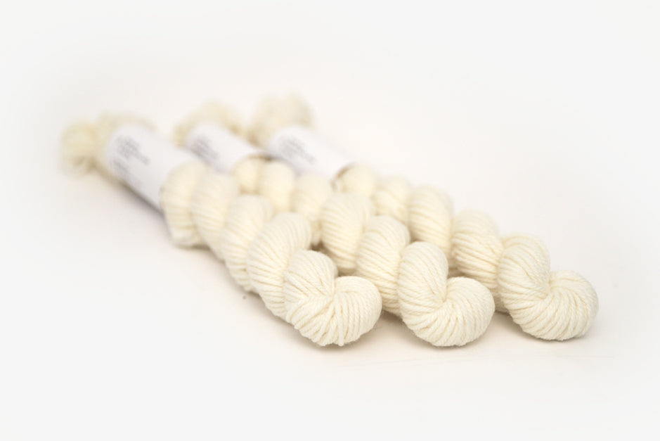 semisolid hand dyed ivory white dk mini yarn
