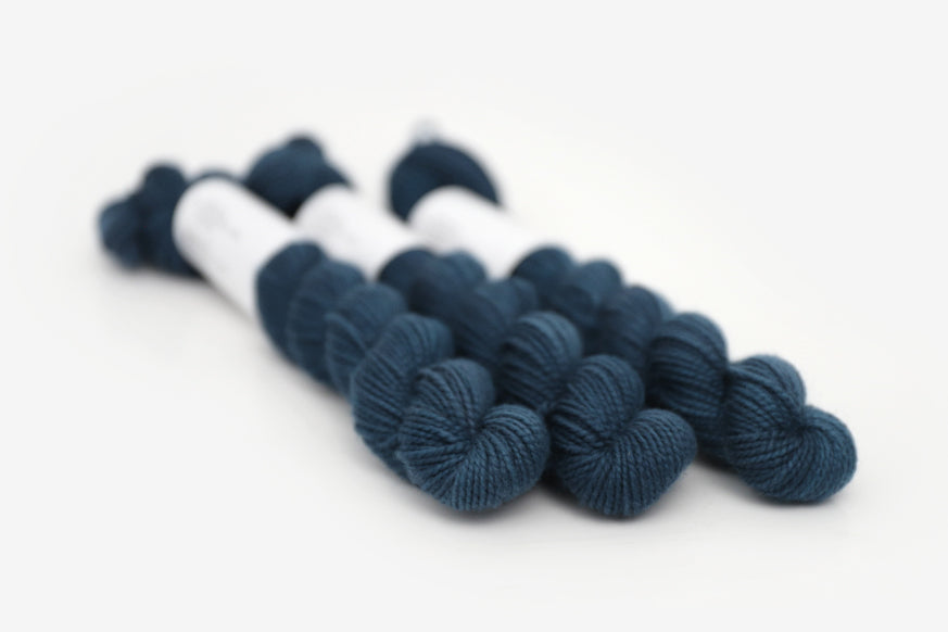 semisolid hand dyed spruce (dark teal green) merino sock mini yarn