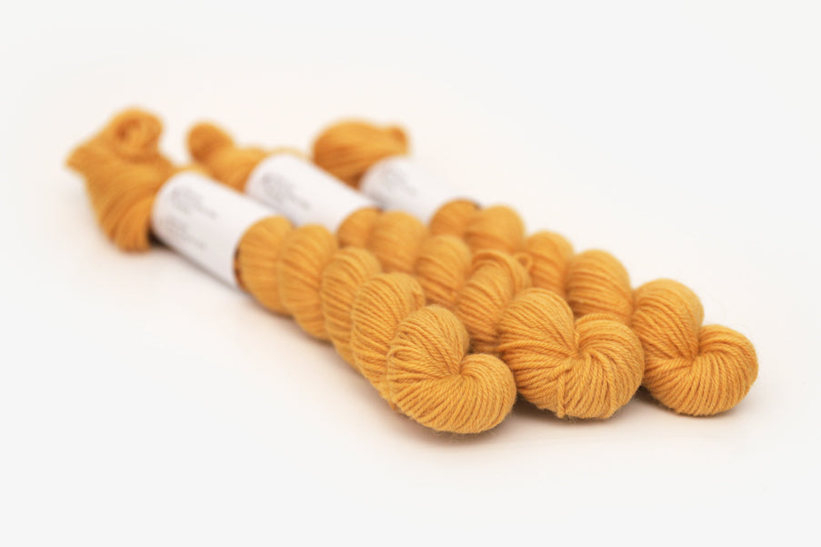semisolid hand dyed squash (mustard gold yellow) phyllis sock mini yarn