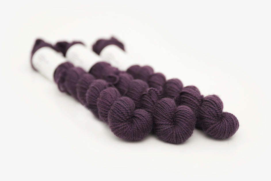 semisolid hand dyed vineyard (dark wine purple) merino sock mini yarn