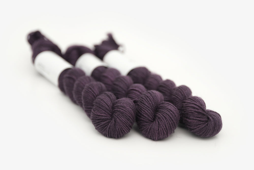 semisolid hand dyed vineyard (dark wine purple) phyllis sock mini yarn